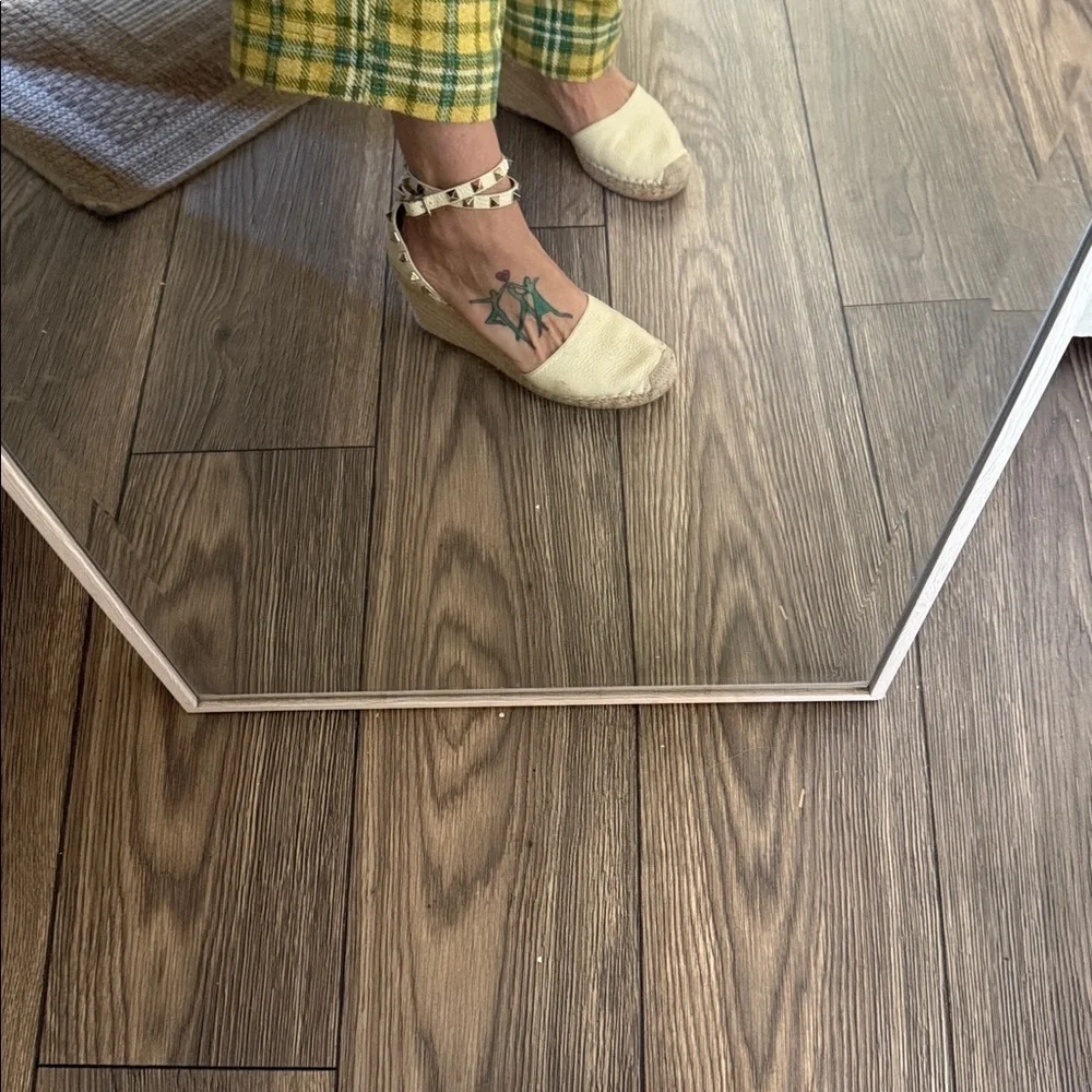 These are Valentino Garavani Rockstud textured-leather espadrille wedge heel